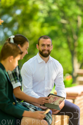 January 2024 / Teacher-with-2-Student-Sitting-Outdoors_240122_Z9E8239