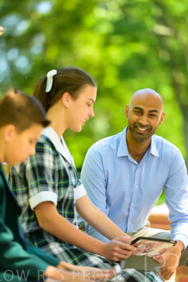 January 2024 / Teacher-with-2-Student-Sitting-Outdoors_240122_Z9E8248