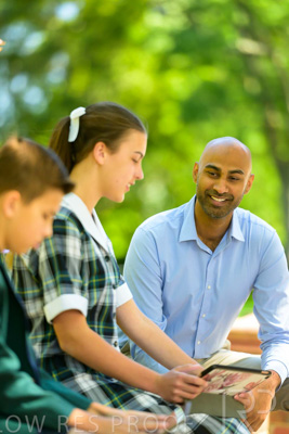 January 2024 / Teacher-with-2-Student-Sitting-Outdoors_240122_Z9E8250