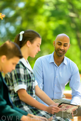January 2024 / Teacher-with-2-Student-Sitting-Outdoors_240122_Z9E8253