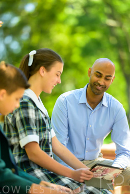 January 2024 / Teacher-with-2-Student-Sitting-Outdoors_240122_Z9E8262