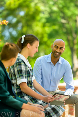 January 2024 / Teacher-with-2-Student-Sitting-Outdoors_240122_Z9E8263