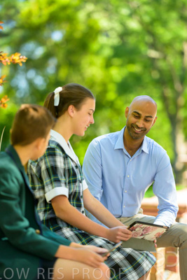 January 2024 / Teacher-with-2-Student-Sitting-Outdoors_240122_Z9E8270