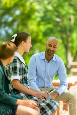 January 2024 / Teacher-with-2-Student-Sitting-Outdoors_240122_Z9E8276