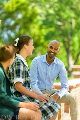 January 2024 / Teacher-with-2-Student-Sitting-Outdoors_240122_Z9E8287