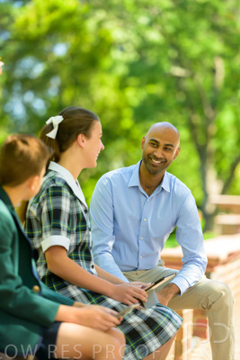 January 2024 / Teacher-with-2-Student-Sitting-Outdoors_240122_Z9E8289