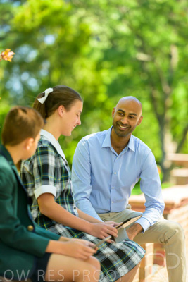 January 2024 / Teacher-with-2-Student-Sitting-Outdoors_240122_Z9E8293