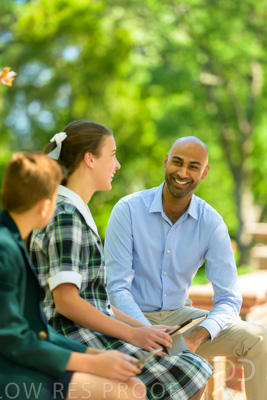 January 2024 / Teacher-with-2-Student-Sitting-Outdoors_240122_Z9E8307