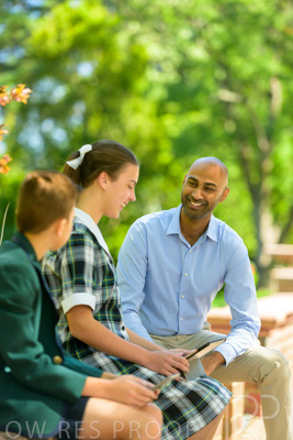January 2024 / Teacher-with-2-Student-Sitting-Outdoors_240122_Z9E8311