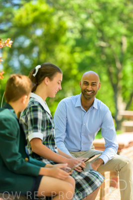 January 2024 / Teacher-with-2-Student-Sitting-Outdoors_240122_Z9E8334