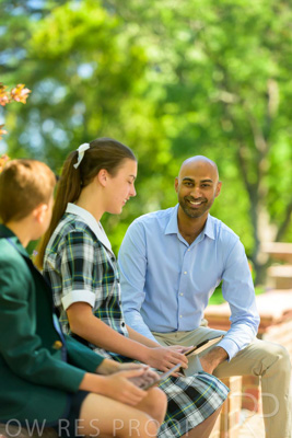 January 2024 / Teacher-with-2-Student-Sitting-Outdoors_240122_Z9E8337