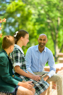 January 2024 / Teacher-with-2-Student-Sitting-Outdoors_240122_Z9E8341