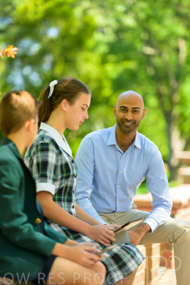 January 2024 / Teacher-with-2-Student-Sitting-Outdoors_240122_Z9E8360