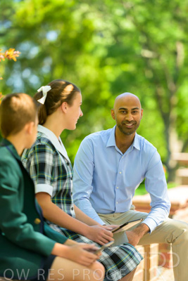 January 2024 / Teacher-with-2-Student-Sitting-Outdoors_240122_Z9E8378