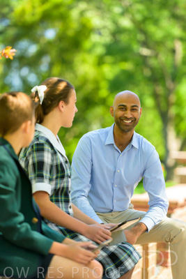 January 2024 / Teacher-with-2-Student-Sitting-Outdoors_240122_Z9E8388