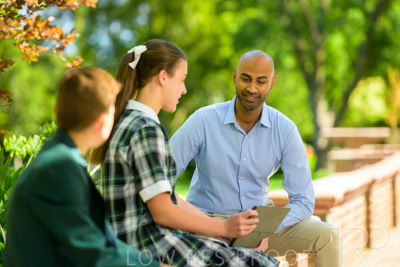 January 2024 / Teacher-with-2-Student-Sitting-Outdoors_240122_Z9E8562