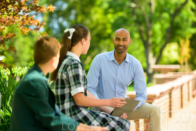 January 2024 / Teacher-with-2-Student-Sitting-Outdoors_240122_Z9E8583