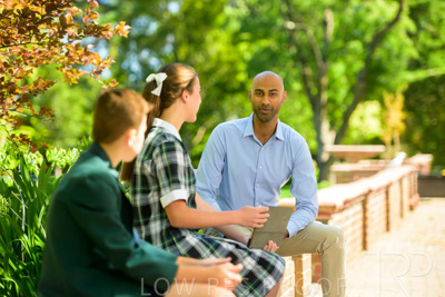 January 2024 / Teacher-with-2-Student-Sitting-Outdoors_240122_Z9E8586