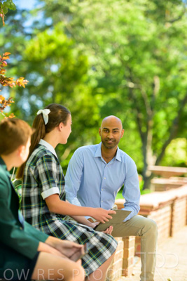 January 2024 / Teacher-with-2-Student-Sitting-Outdoors_240122_Z9E8597