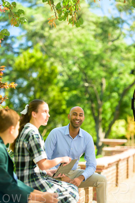 January 2024 / Teacher-with-2-Student-Sitting-Outdoors_240122_Z9E8612