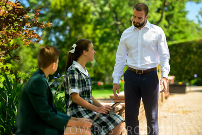 January 2024 / Teacher-with-2-Student-Standing-Outdoors_240122_Z9E7831