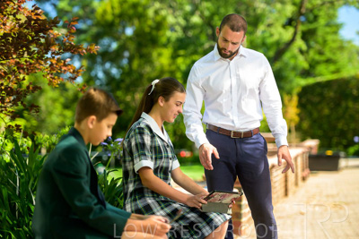 January 2024 / Teacher-with-2-Student-Standing-Outdoors_240122_Z9E7834