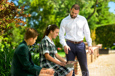 January 2024 / Teacher-with-2-Student-Standing-Outdoors_240122_Z9E7836