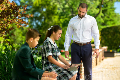 January 2024 / Teacher-with-2-Student-Standing-Outdoors_240122_Z9E7848