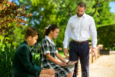 January 2024 / Teacher-with-2-Student-Standing-Outdoors_240122_Z9E7851